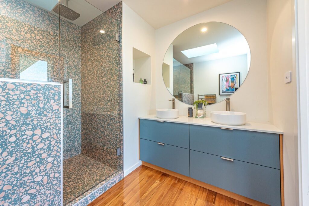 Bathroom walls painted in the timeless warm white of Dulux Remuera