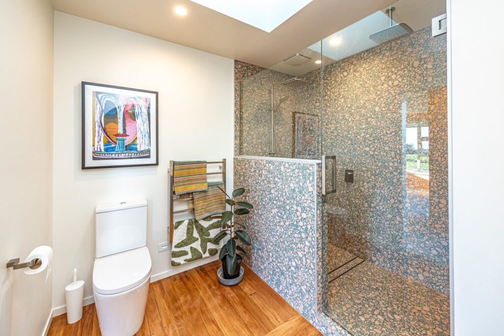 Bathroom walls painted in the timeless warm white of Dulux Remuera