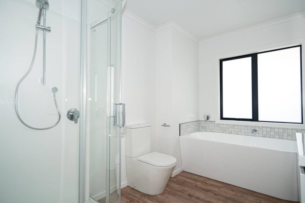 Modern new build with interior walls spray finished in the soft and chalky grey white of Resene Black White