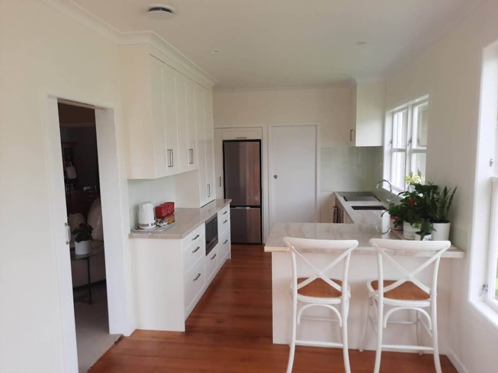 This past project showcases a kitchen renovation that is fresh and bright