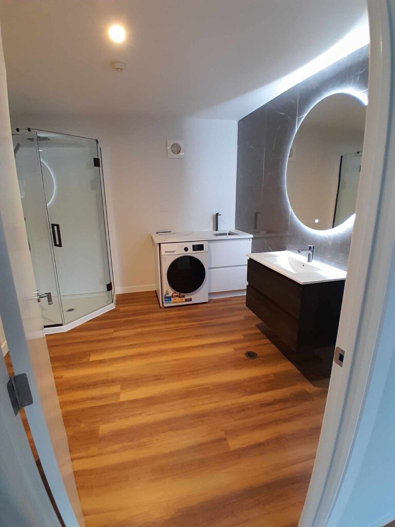 Restoration and conversion of the 1914 Johnston & Co building into apartments and office spaces with interior painting by the Swish Decorating team of quality painters