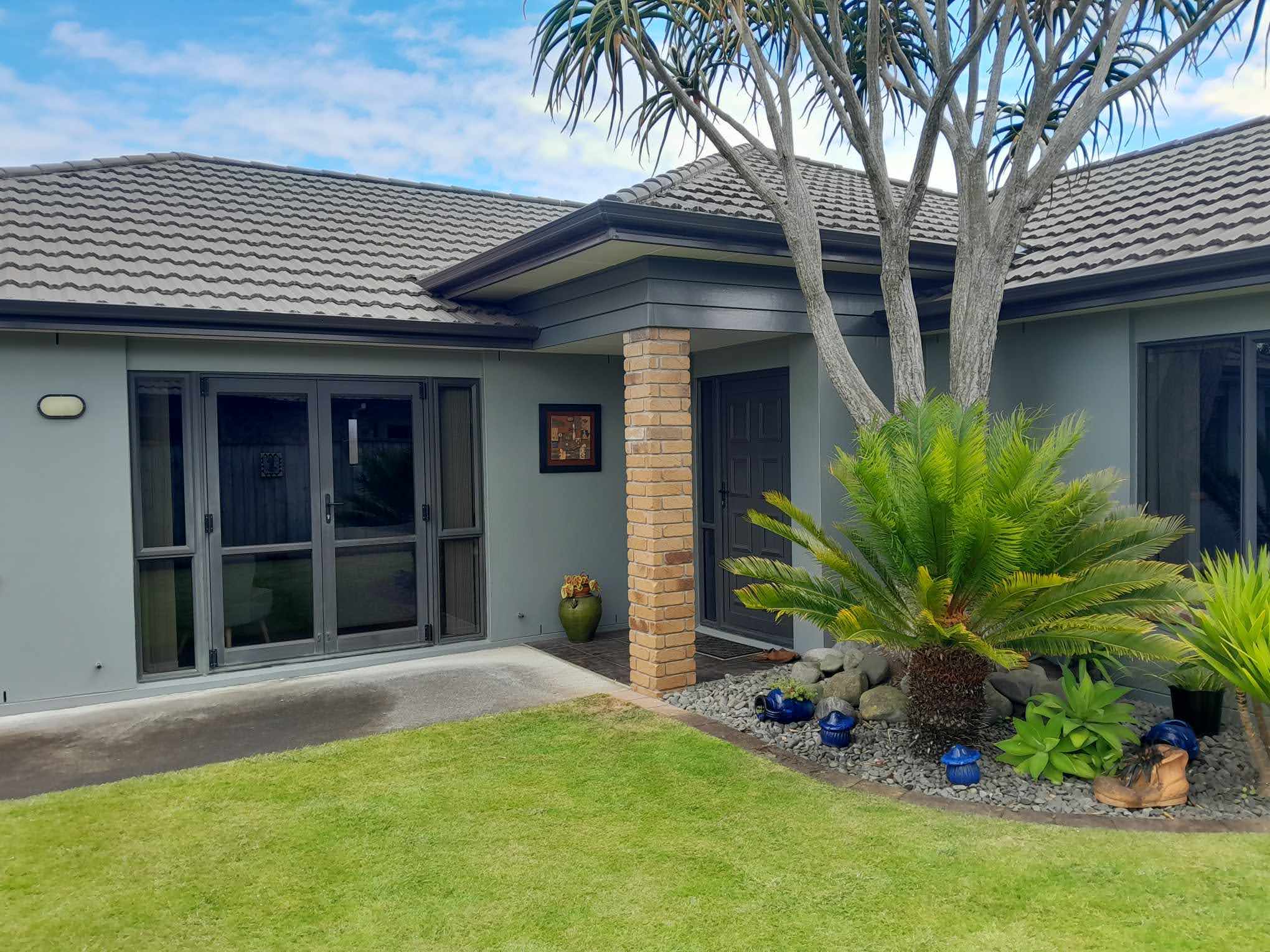 The exterior of this home has been revived by the professional painters at Swish Decorating