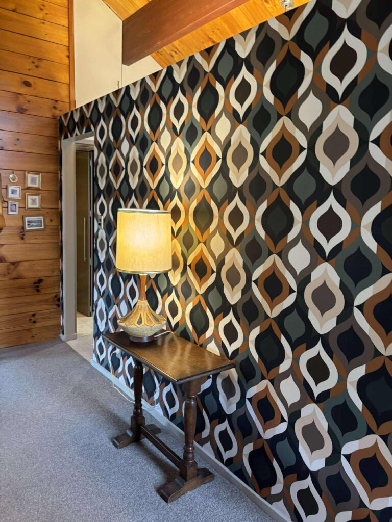 Mid-century modern inspired wallpaper feature wall hung by the professional decorators at Swish Decorating in this past project