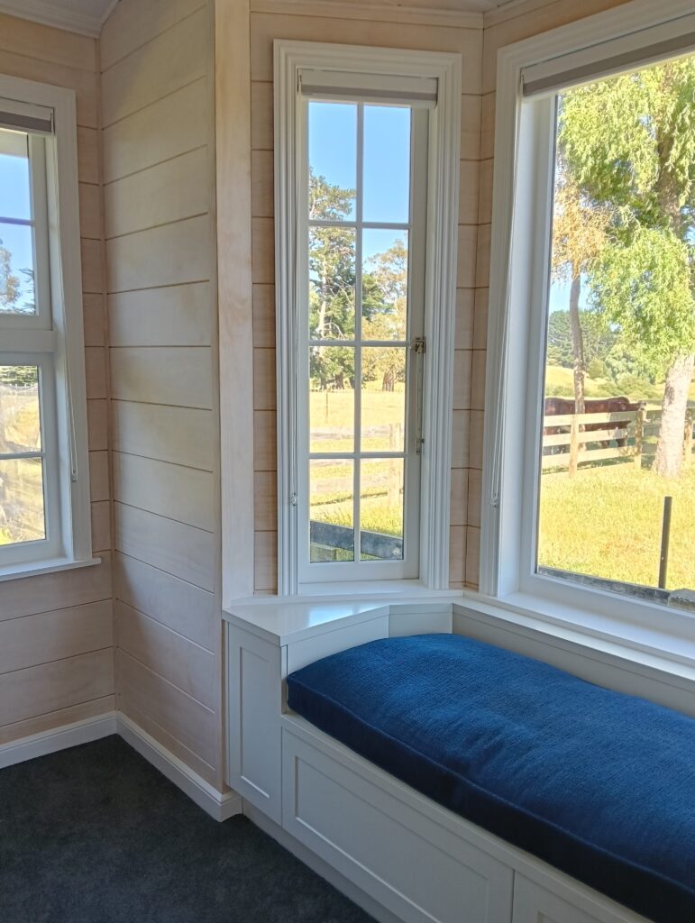 Complete interior renovation for these clients with walls whitewashed in Resene Greywash and trims in Resene Black White