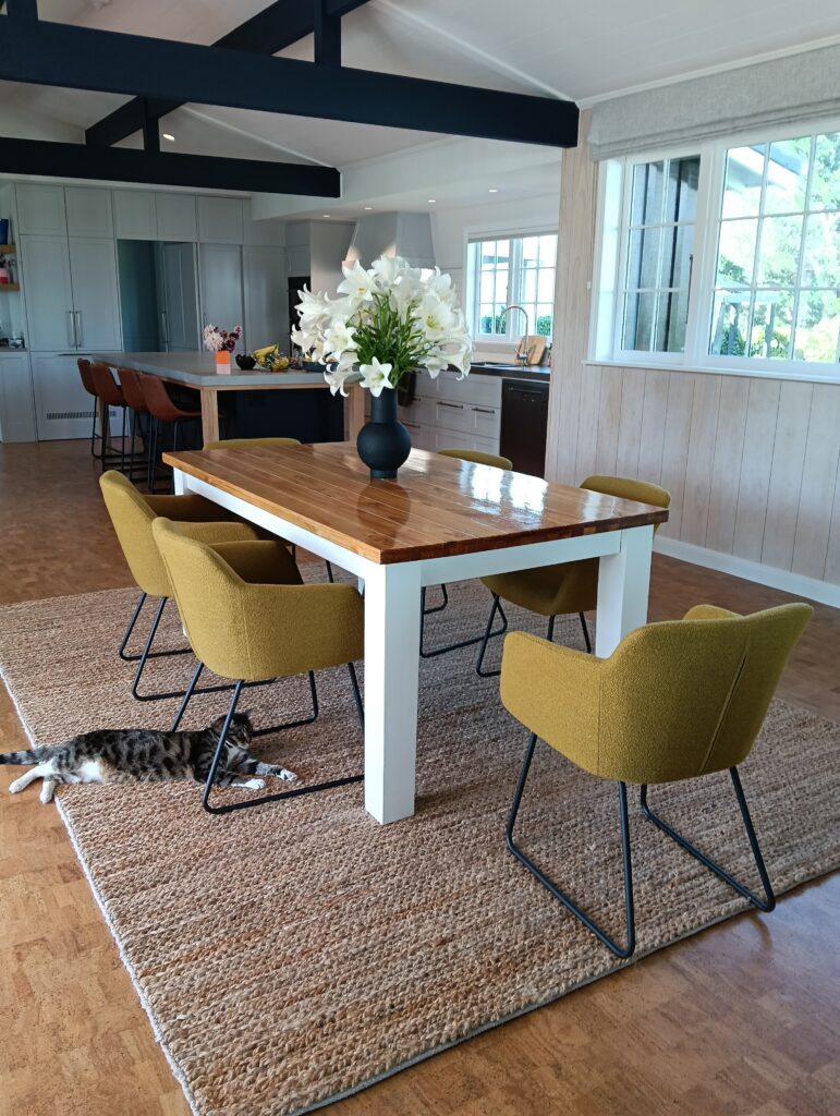 Complete interior renovation for these clients with a beautiful airy open plan living area featuring walls whitewashed in Resene Greywash, ceiling beams in Indian Ink and ceiling in Black White