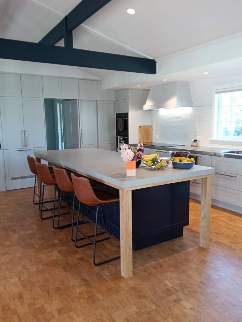 Complete interior renovation for these clients with a beautiful airy open plan living area featuring walls whitewashed in Resene Greywash, ceiling beams in Indian Ink and ceiling in Black White