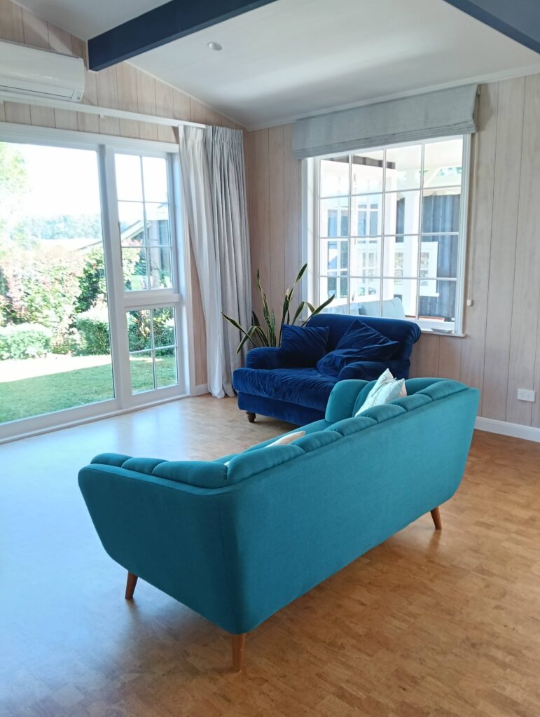 Complete interior renovation for these clients with a beautiful airy open plan living area featuring walls whitewashed in Resene Greywash, ceiling beams in Indian Ink and ceiling in Black White