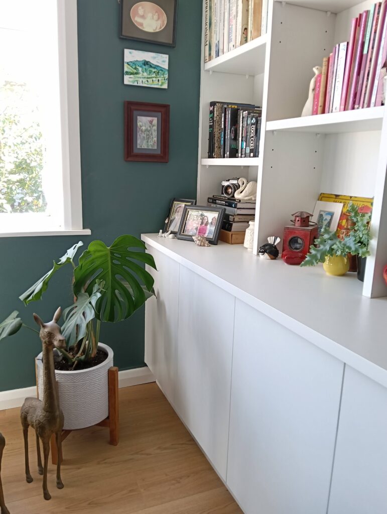 Walls painted by Swish Decorating in Resene Green Meets Blue in this bold open plan living space