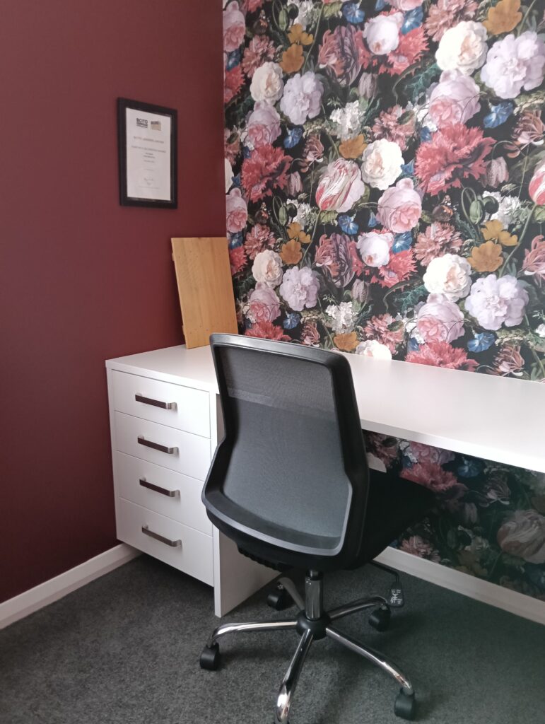 Resene Avant Garde pairs beautifully with this dramatic floral feature wall, hung by the team at Swish Decorating