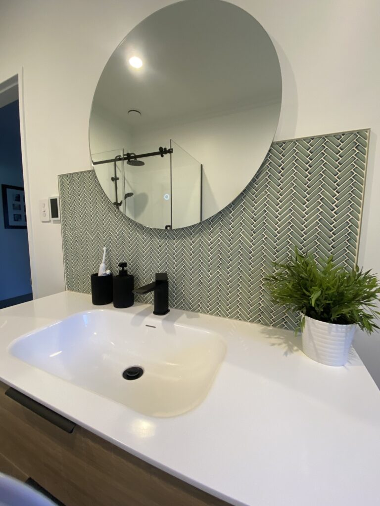 A clean, fresh and modern finish to this bathroom with walls painted in Resene Alabaster by the quality painters at Swish Decorating