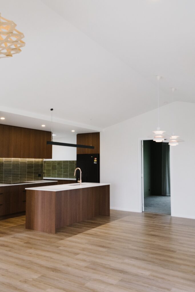 View from the open plan living area through to the media room